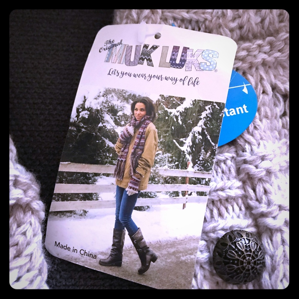Muk Luks tan knit boots size 7, brand new.